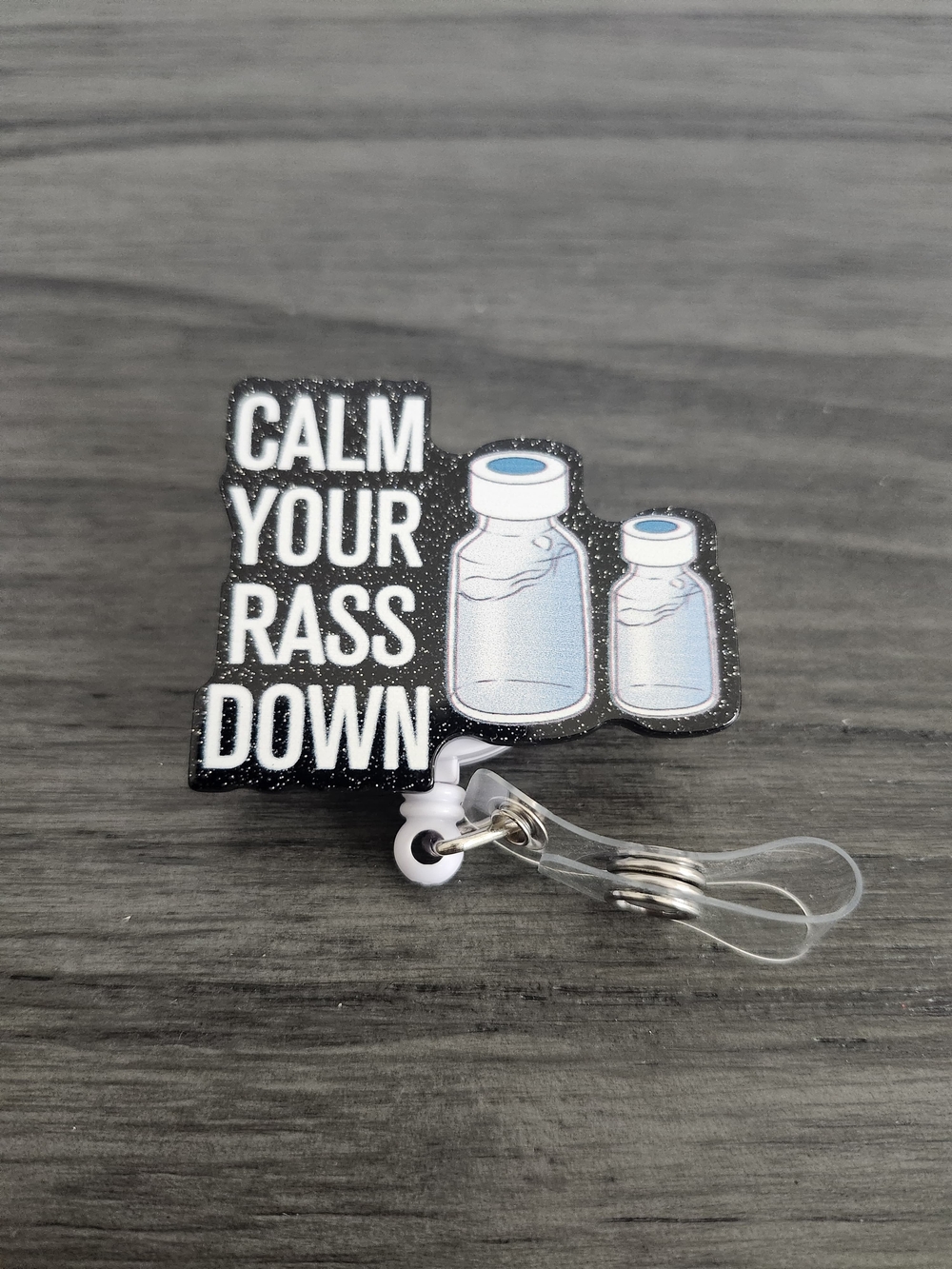 Calm Your Rass Down Glitter Badge Reel - Black